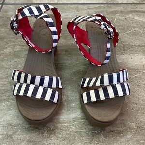 Crocs sandal heels. Canvas cross ankle straps, plastic wedge heels